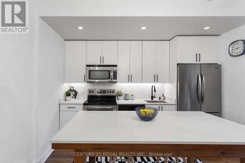 #312 -25 Ritchie Ave, Toronto, ON - Indoor Photo Showing Kitchen With Stainless Steel Kitchen With Upgraded Kitchen