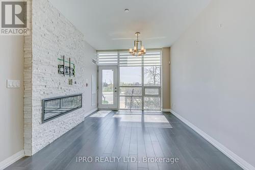 106 - 75 Eglinton Avenue W, Mississauga, ON - Indoor With Fireplace