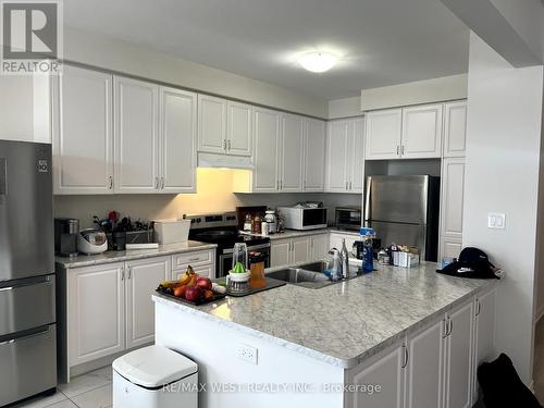 85 Riverwalk Dr, Hamilton, ON - Indoor Photo Showing Kitchen With Double Sink