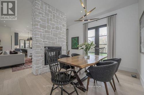 185 Commissioners Rd E, London, ON - Indoor Photo Showing Dining Room With Fireplace
