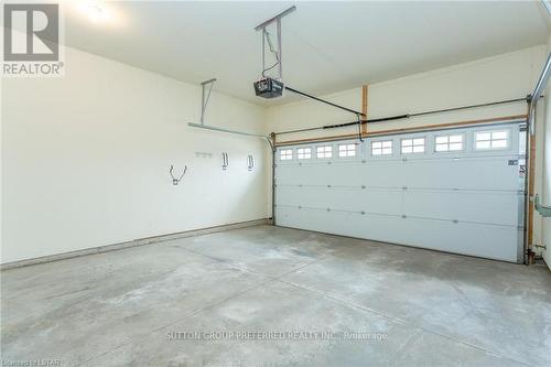 #6 -2295 Kains Rd, London, ON - Indoor Photo Showing Garage