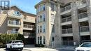 308 - 1460 Bishops Gate, Oakville, ON  - Outdoor With Balcony With Facade 