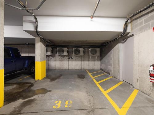 Parking - 302-16 Rue Roger-Pilon, Dollard-Des-Ormeaux, QC - Indoor Photo Showing Garage