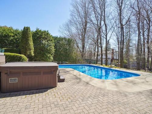 Cour - 920 Rue De La Pommeraie, Mont-Saint-Hilaire, QC - Outdoor With In Ground Pool With Backyard