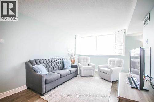 Lph11 - 2466 Eglinton Avenue E, Toronto, ON - Indoor Photo Showing Living Room