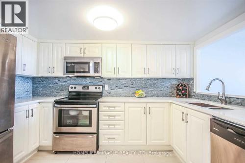 Lph11 - 2466 Eglinton Avenue E, Toronto, ON - Indoor Photo Showing Kitchen With Double Sink With Upgraded Kitchen