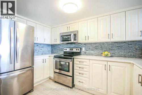 Lph11 - 2466 Eglinton Avenue E, Toronto, ON - Indoor Photo Showing Kitchen With Upgraded Kitchen