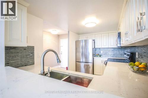 Lph11 - 2466 Eglinton Avenue E, Toronto, ON - Indoor Photo Showing Kitchen With Double Sink With Upgraded Kitchen