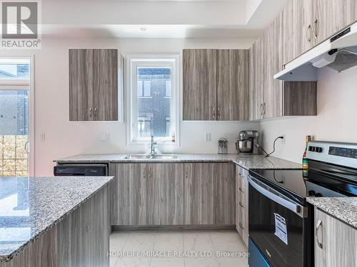 23 Quilico Road, Vaughan, ON - Indoor Photo Showing Kitchen With Double Sink