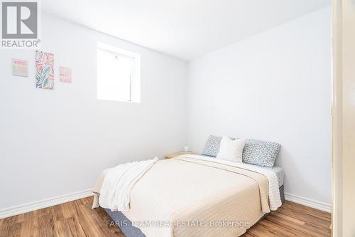 43 Cameron St, Springwater, ON - Indoor Photo Showing Bedroom