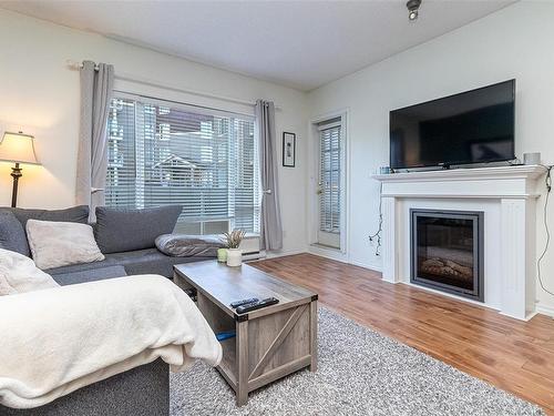 105-2823 Jacklin Rd, Langford, BC - Indoor Photo Showing Living Room With Fireplace