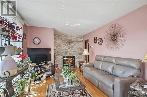 1781 Queensdale Avenue, Ottawa, ON - Indoor Photo Showing Living Room With Fireplace