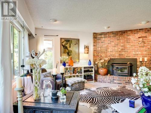 2241 Roberts Road, Powell River, BC - Indoor Photo Showing Living Room With Fireplace