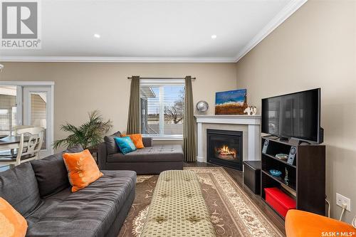 302 959 Bradley Street, Moose Jaw, SK - Indoor Photo Showing Living Room With Fireplace