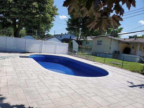 Piscine - 1605 Rue Talleyrand, Brossard, QC - Outdoor With In Ground Pool With Backyard