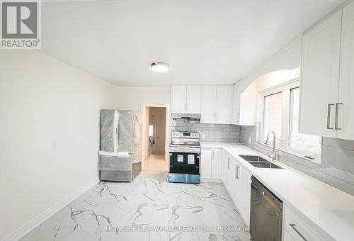 52 Dukinfield Crescent, Toronto, ON - Indoor Photo Showing Kitchen With Double Sink