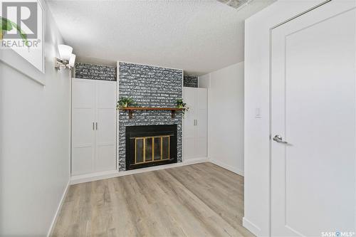 217 Waterloo Crescent, Saskatoon, SK - Indoor With Fireplace