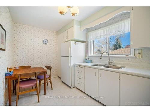 76 Ellington Dr, Toronto, ON - Indoor Photo Showing Kitchen With Double Sink