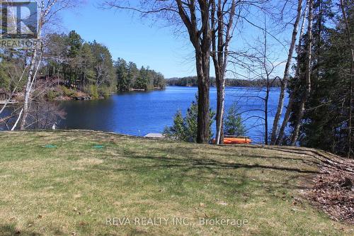 1724 Lewis Road, Highlands East, ON - Outdoor With Body Of Water With View