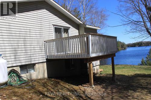 1724 Lewis Road, Highlands East, ON - Outdoor With Body Of Water With Exterior