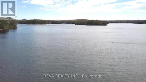 1724 Lewis Road, Highlands East, ON - Outdoor With Body Of Water With View