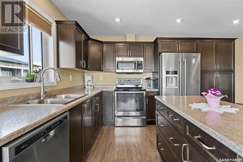 325 915 Kristjanson Road, Saskatoon, SK - Indoor Photo Showing Kitchen With Stainless Steel Kitchen With Double Sink