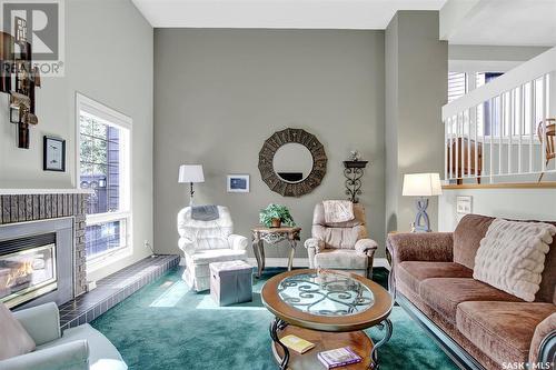 67 Quincy Drive, Regina, SK - Indoor Photo Showing Living Room With Fireplace