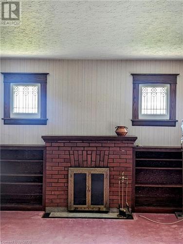 fireplace - 820 Yonge St S, Walkerton, ON - Indoor With Fireplace