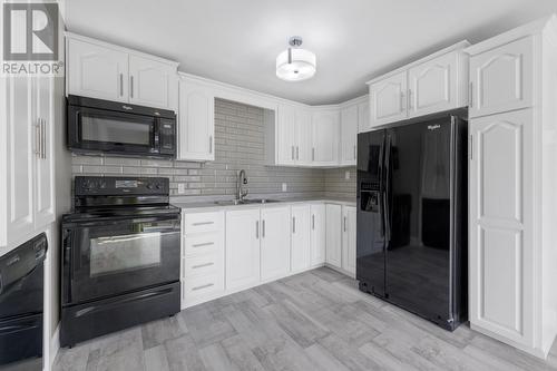 44 Greeley Garden, Conception Bay South, NL - Indoor Photo Showing Kitchen With Double Sink