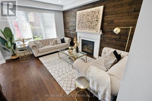 1000 Savoline Boulevard W, Milton, ON - Indoor Photo Showing Living Room With Fireplace
