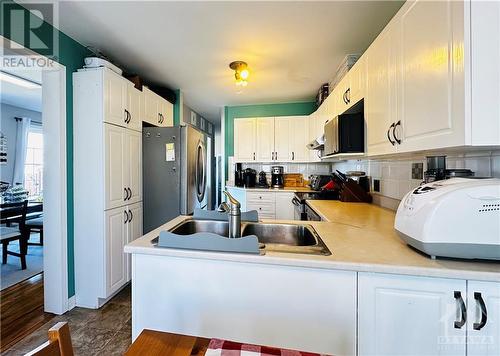 4373 Wildmint Square, Ottawa, ON - Indoor Photo Showing Kitchen With Double Sink