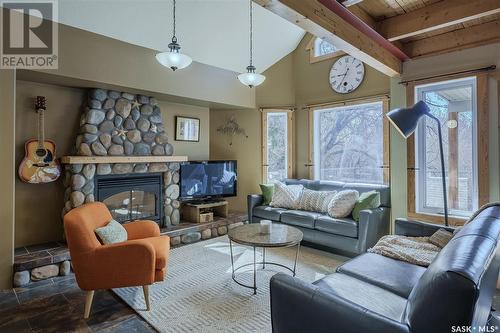 49 Mccrimmon Crescent, Blackstrap Shields, SK - Indoor Photo Showing Living Room With Fireplace
