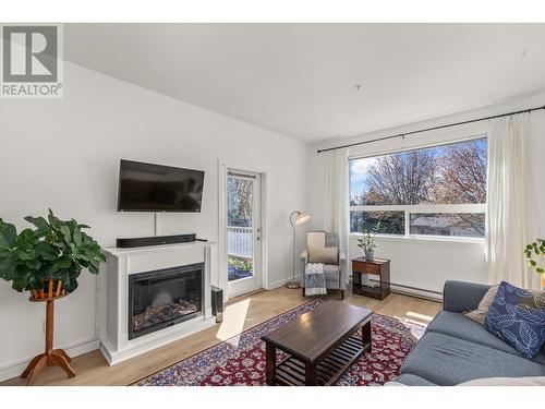778 Rutland Road N Unit# 204, Kelowna, BC - Indoor Photo Showing Living Room With Fireplace