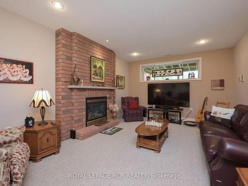 60 Renaissance Pt, New Tecumseth, ON - Indoor Photo Showing Living Room With Fireplace
