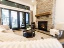 9567 Benchland Drive, Lake Country, BC  - Indoor Photo Showing Living Room With Fireplace 
