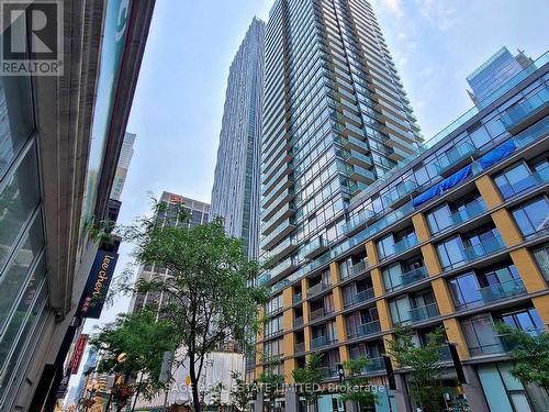 1605 - 1 Yorkville Avenue, Toronto, ON - Outdoor With Balcony With Facade