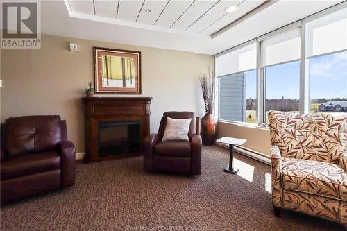 185 Royal Oaks Blvd Unit#108, Moncton, NB - Indoor Photo Showing Living Room With Fireplace