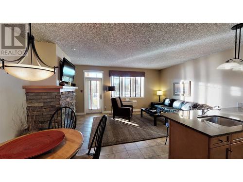 400 Bighorn Boulevard Unit# 415 N, Radium Hot Springs, BC - Indoor With Fireplace