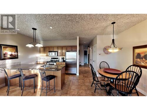 400 Bighorn Boulevard Unit# 415 N, Radium Hot Springs, BC - Indoor Photo Showing Dining Room