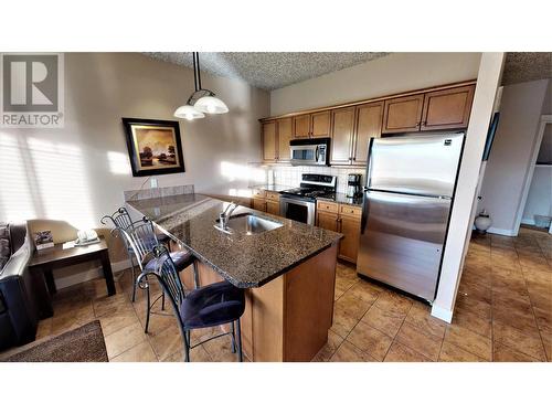 400 Bighorn Boulevard Unit# 415 N, Radium Hot Springs, BC - Indoor Photo Showing Kitchen With Stainless Steel Kitchen