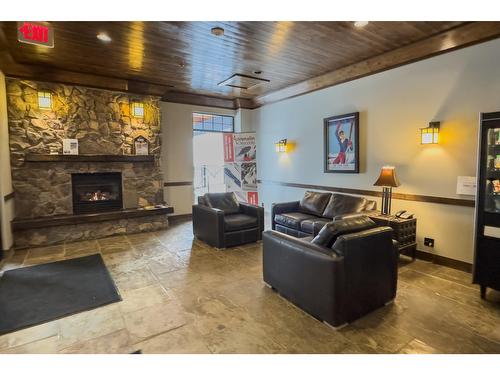 409 - 1545 Kicking Horse Trail, Golden, BC - Indoor With Fireplace