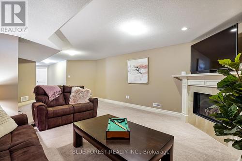7 - 2081 Wallingford Avenue, London, ON - Indoor Photo Showing Living Room With Fireplace