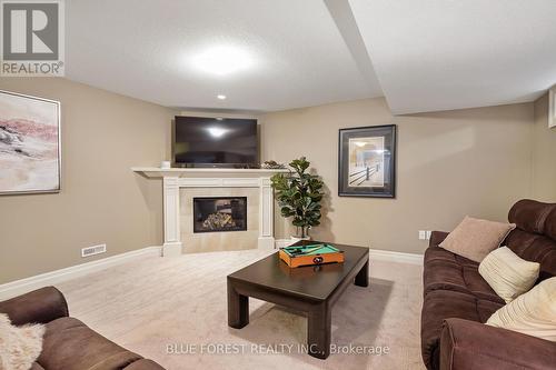 7 - 2081 Wallingford Avenue, London, ON - Indoor Photo Showing Living Room With Fireplace