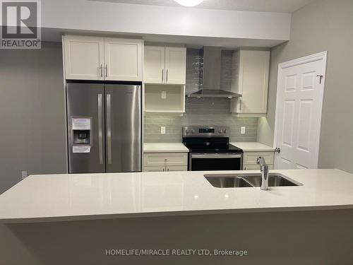 84 Oat Lane, Kitchener, ON - Indoor Photo Showing Kitchen With Double Sink