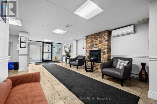 803 - 64 Benton Street, Kitchener, ON - Indoor With Fireplace