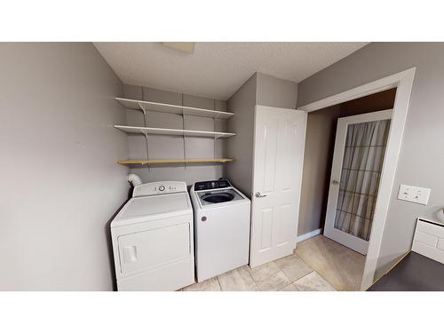 302 - 10 Cariboo Drive, Elkford, BC - Indoor Photo Showing Laundry Room