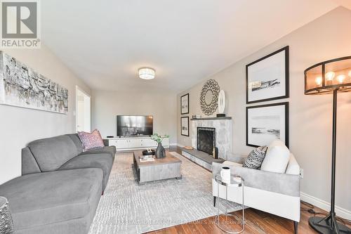 26 Eden Valley Drive, Toronto, ON - Indoor Photo Showing Living Room With Fireplace