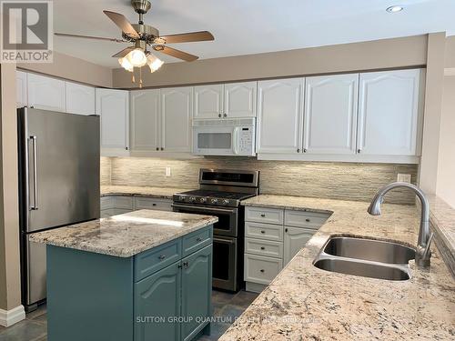 4C - 928 Queen Street W, Mississauga, ON - Indoor Photo Showing Kitchen With Double Sink