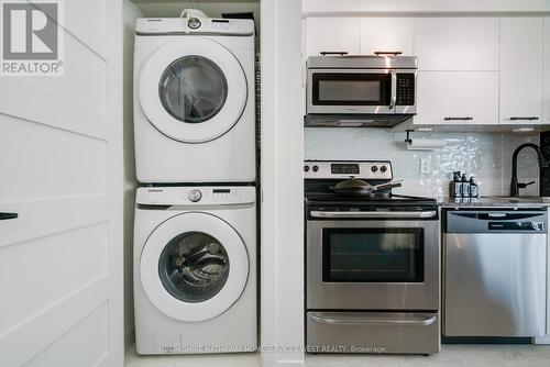 1401 - 38 Joe Shuster Way, Toronto, ON - Indoor Photo Showing Laundry Room