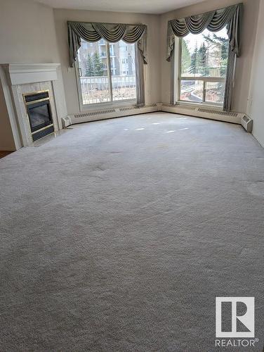 #229 15499 Castle Downs Road Rd Nw Nw, Edmonton, AB - Indoor With Fireplace